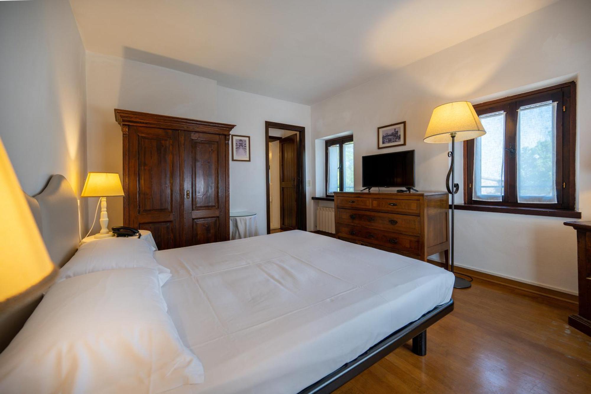 Hotel Palazzo Viviani Castello Di Montegridolfo Pokój zdjęcie