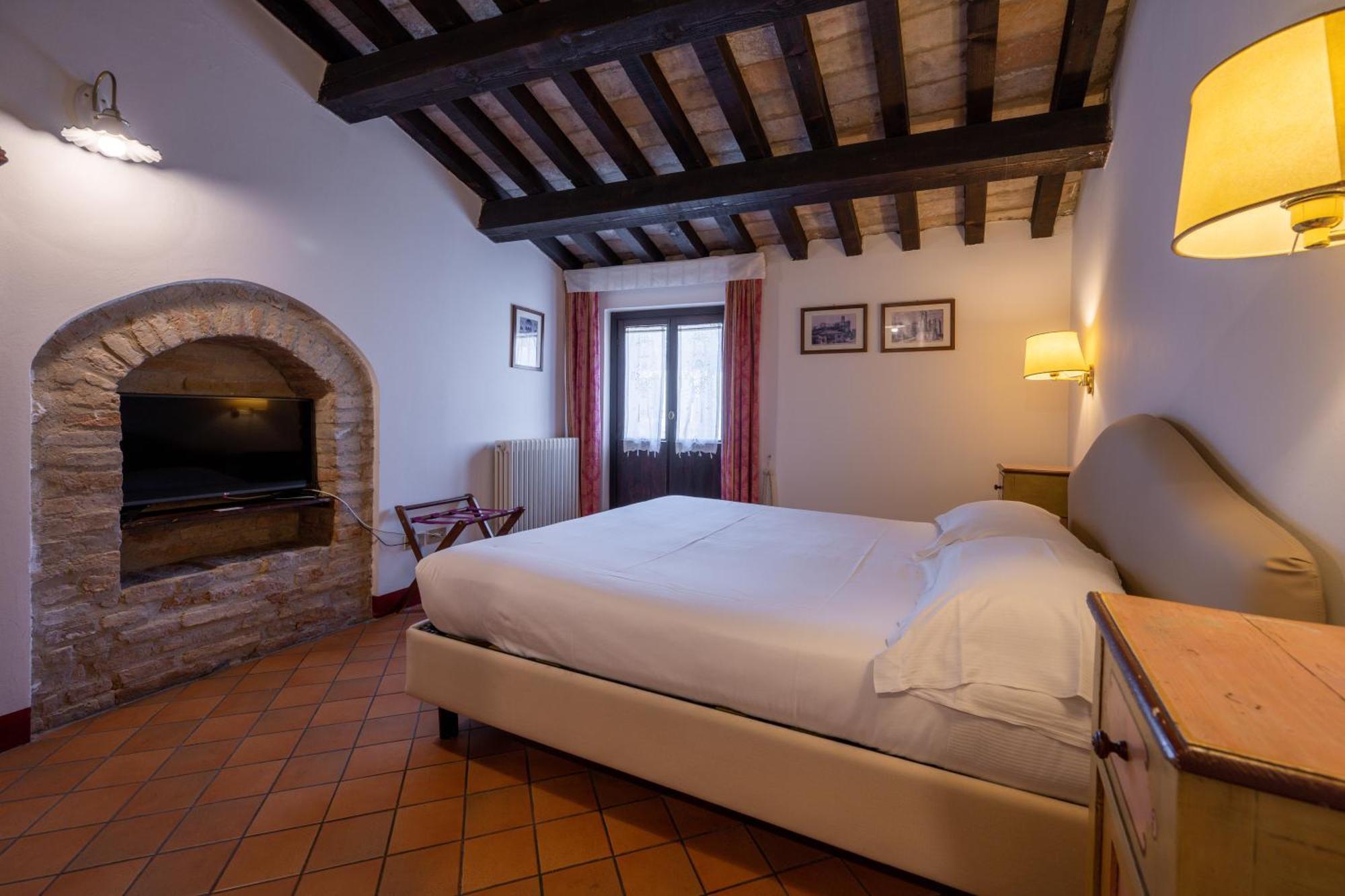 Hotel Palazzo Viviani Castello Di Montegridolfo Pokój zdjęcie
